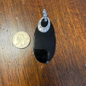Black Onyx Pendant with Sterling Silver accent.